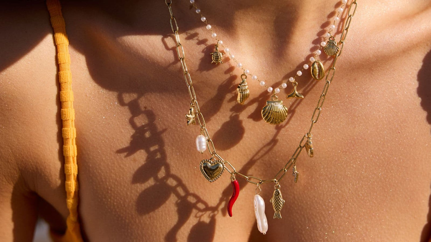 La tendencia marina en joyería: así se llevan los charms del mar este verano - Anartxy