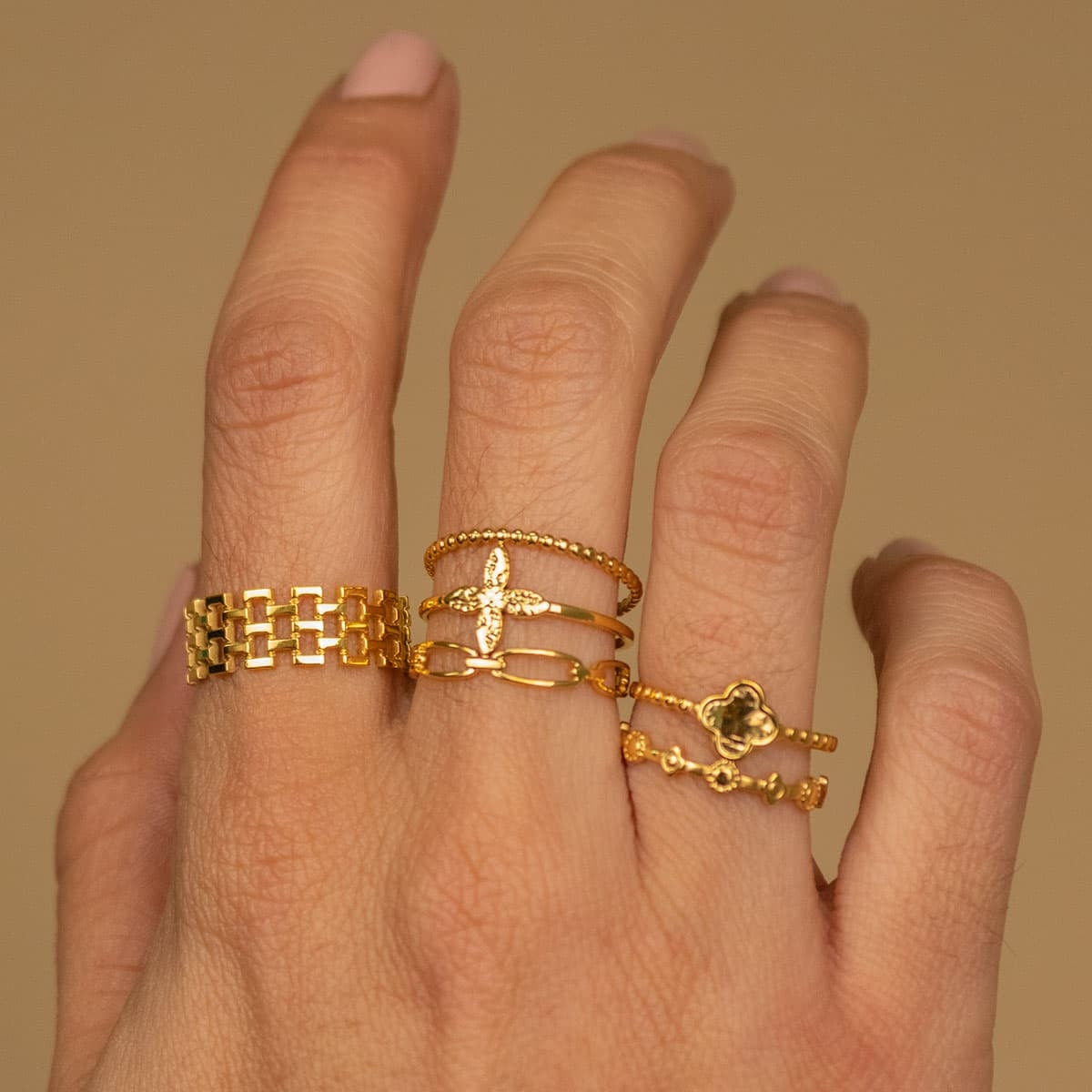 anillo acero flor dorado