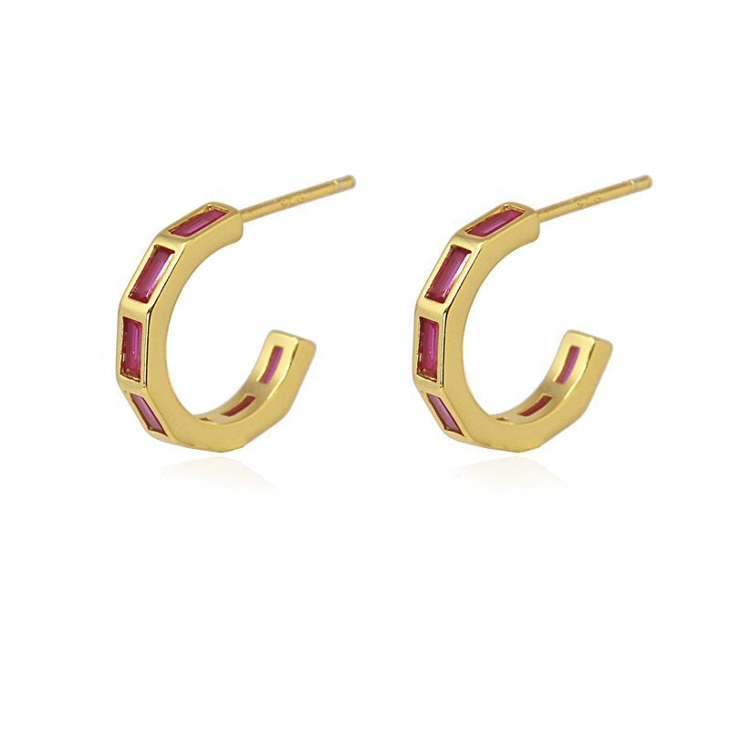 Aros dorados con circonitas fucsia