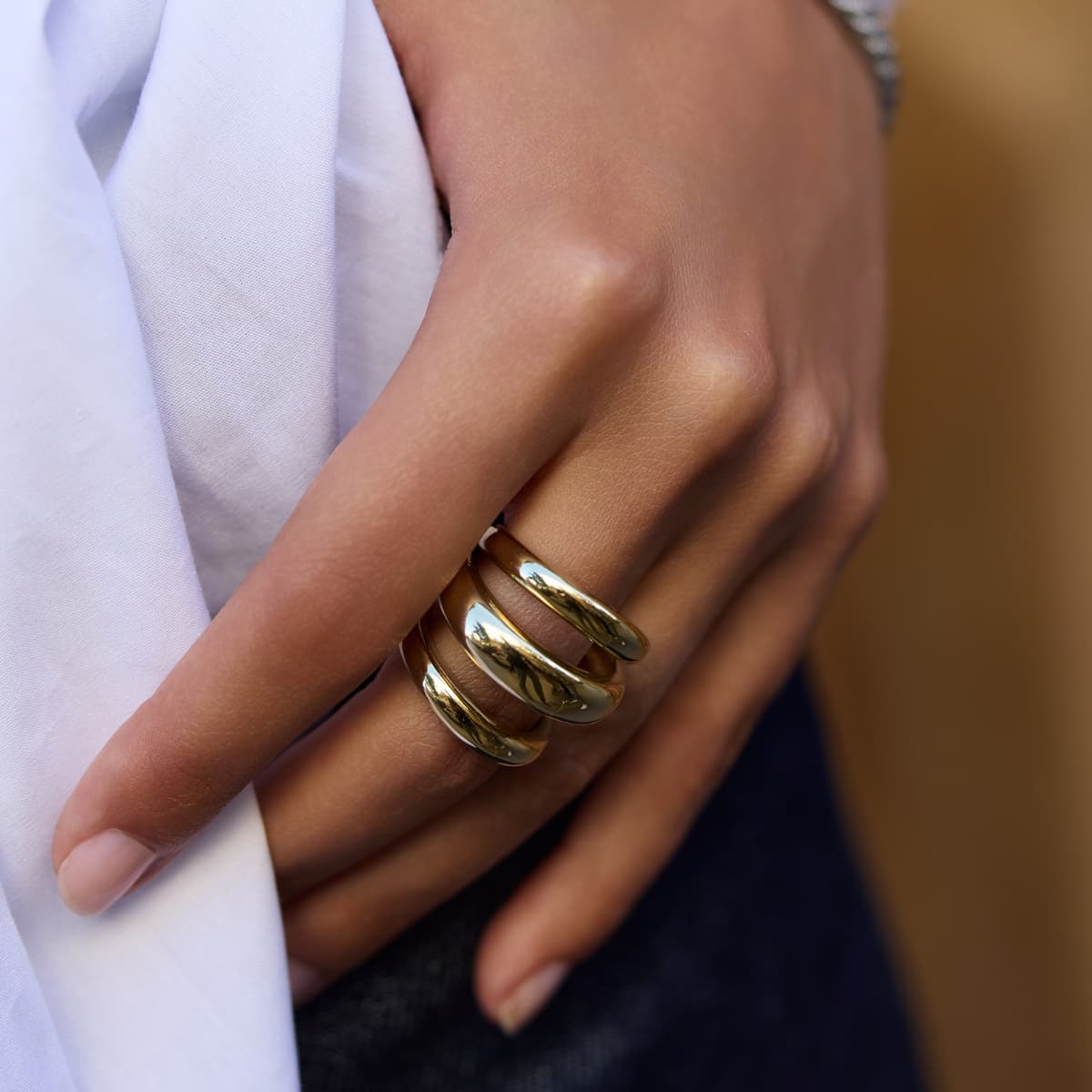 Anillo Essentials triple banda dorado