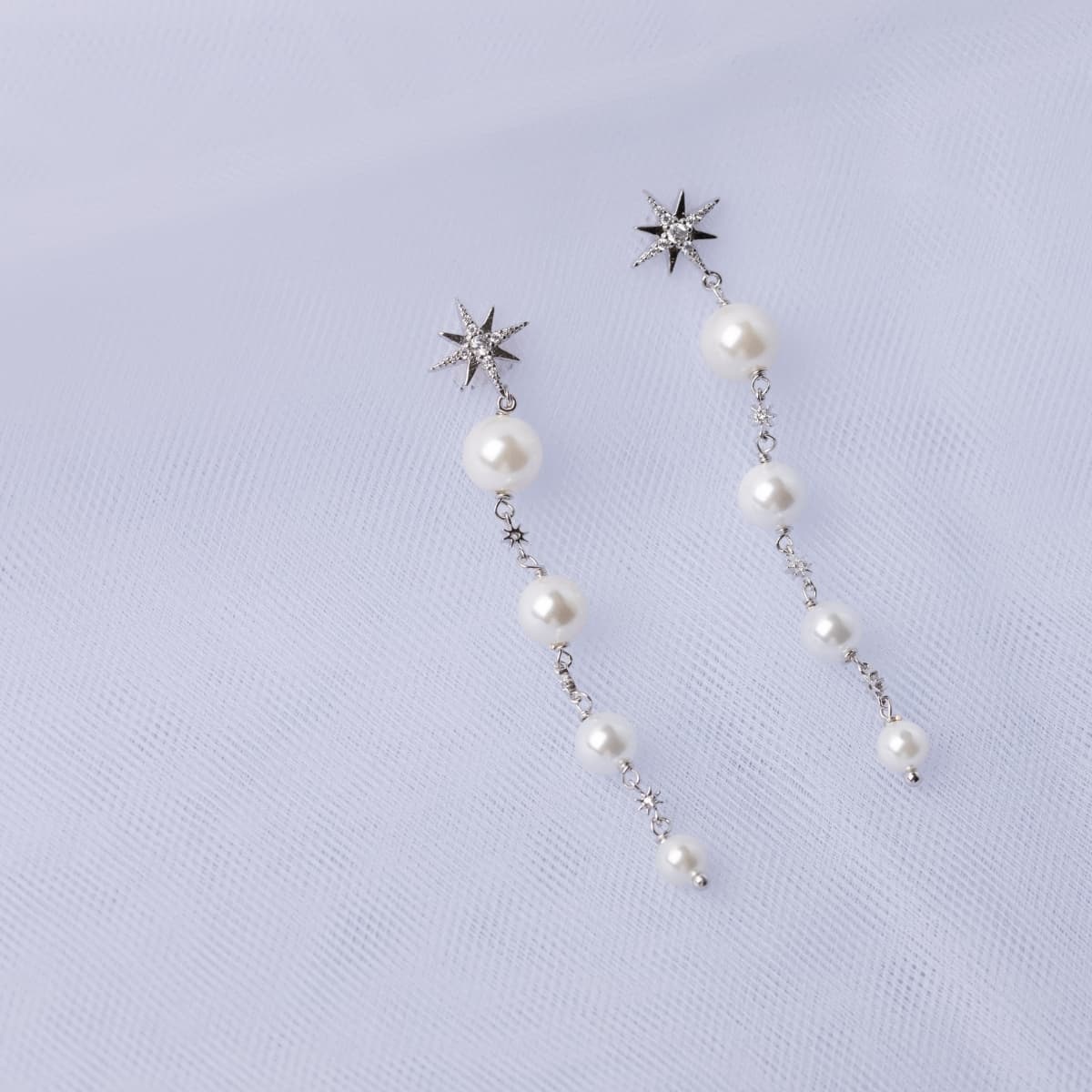 Pendientes Alma cadenas perlas estrella